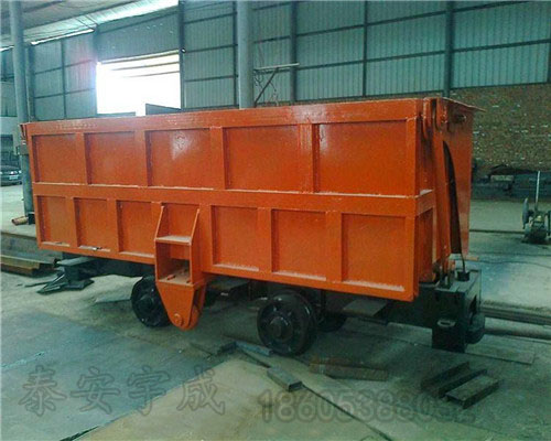 单侧曲轨侧卸式矿车